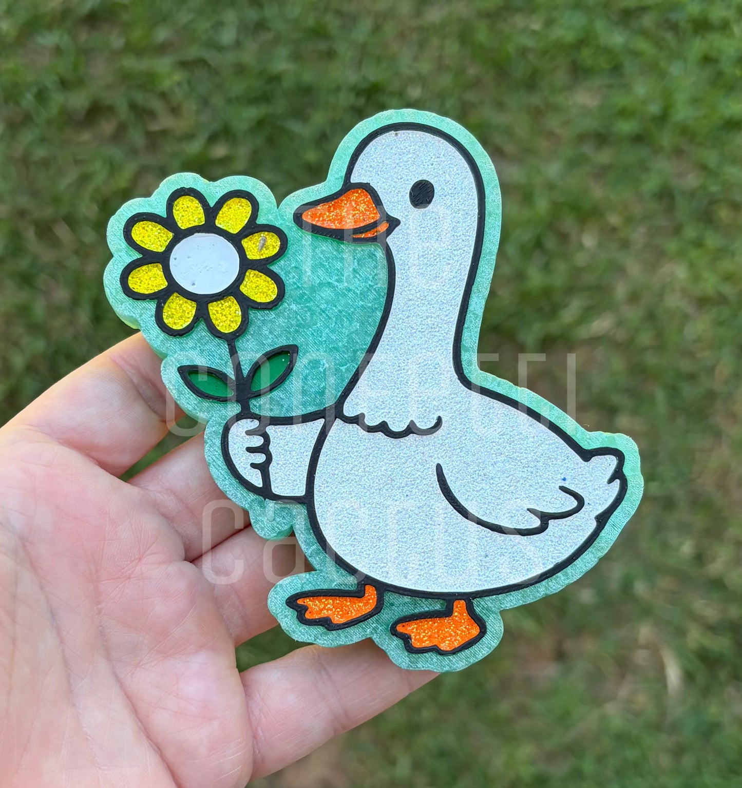 Goose holding a Flower