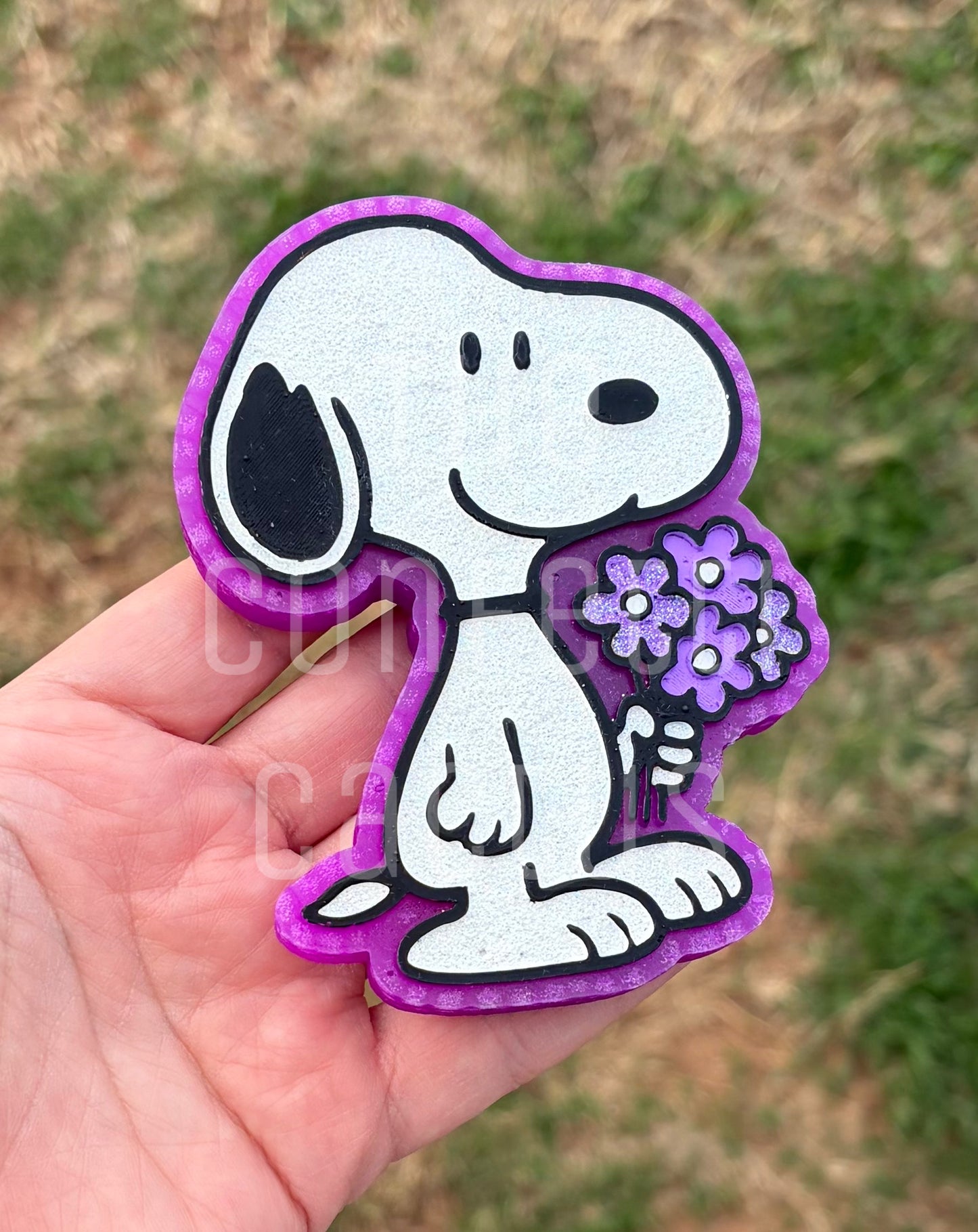 Dog holding Bouquet