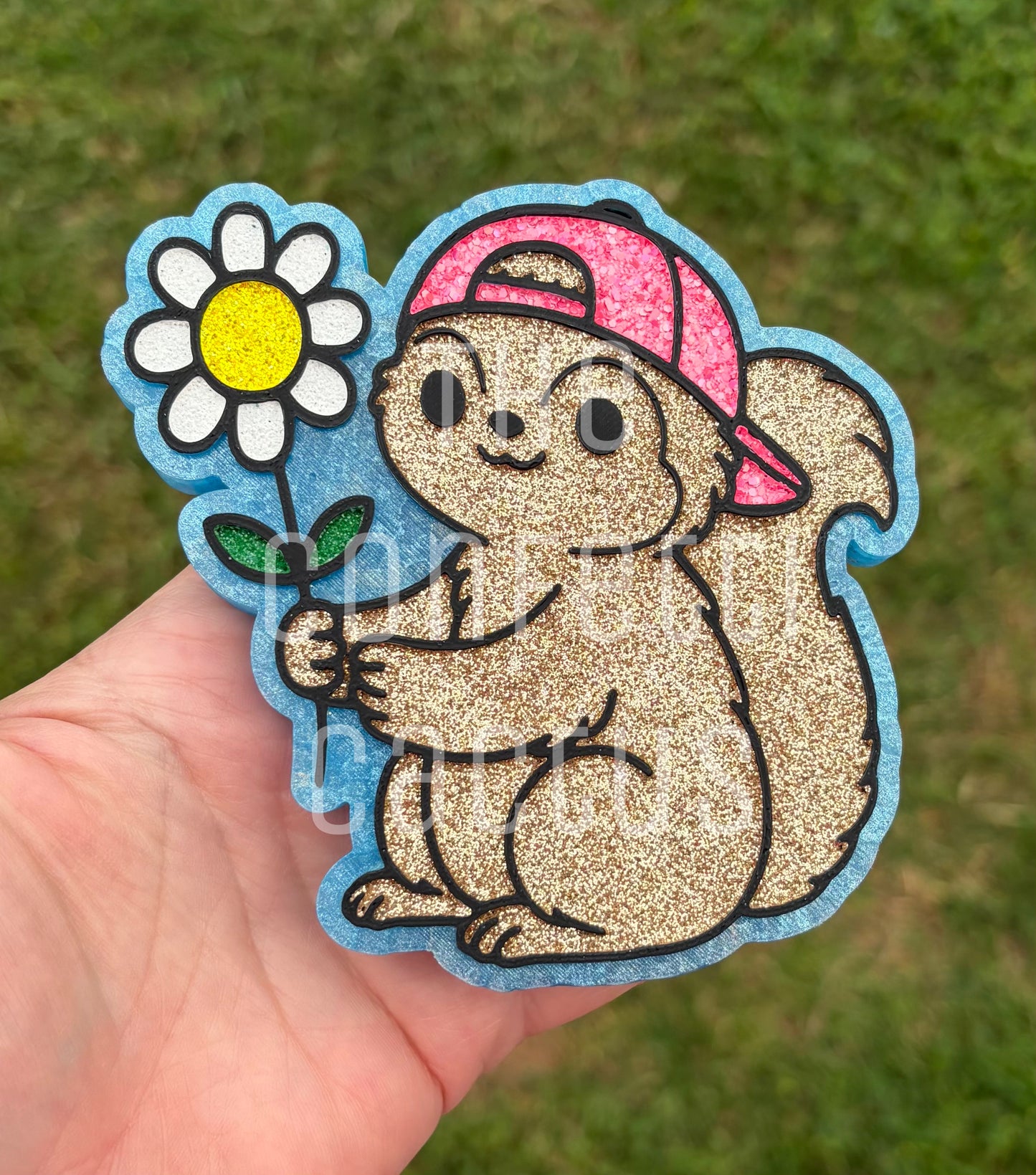 Squirrel holding a Flower