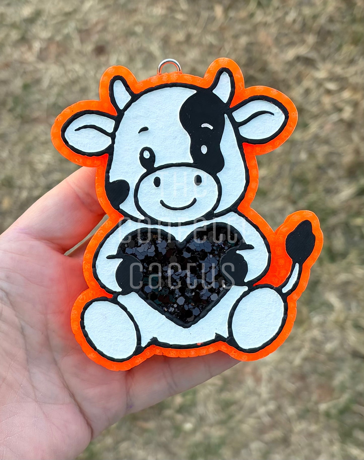 Cow holding a Heart