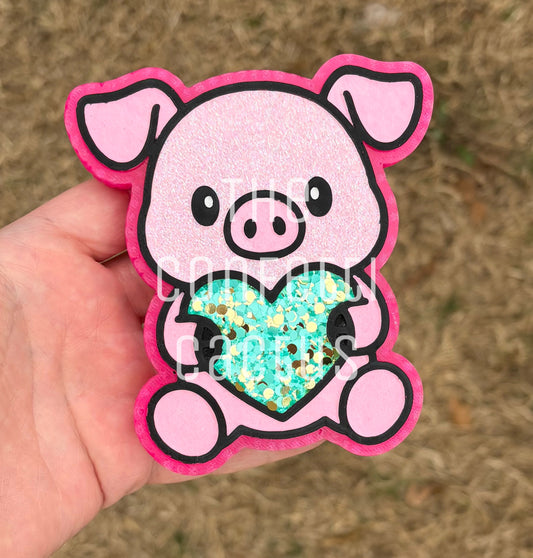 Pig holding a Heart